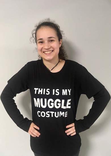 Audray wearing a t-shirt that says 'This is my Muggle Costume'